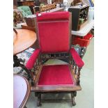 An early 20th century walnut framed American style rocking chair