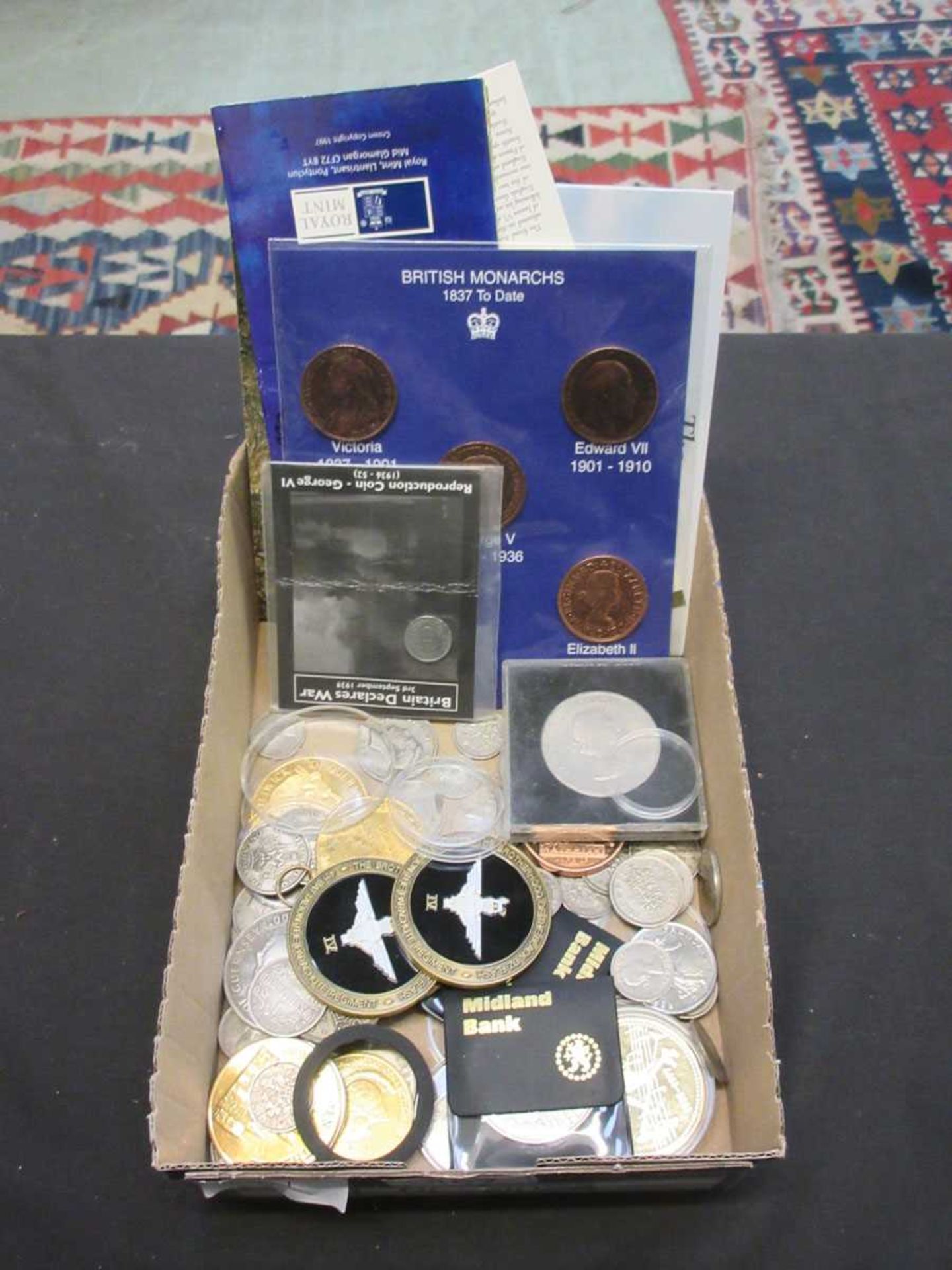 A box containing a quantity of coinage