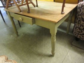 A scrubbed top pine table having a later painted green base with drawer