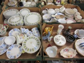 Four trays of ceramic tableware to include cups, saucers, part dinner set, etc