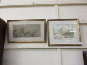 Two gilt framed and glazed watercolours, one of mountainous scene, the other of African houses