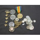 A bag containing a quantity of pre-1947 currency together with an assortment of medals and