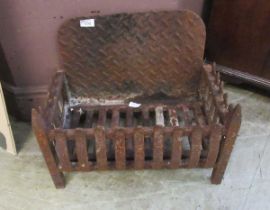 A cast metal fire basket