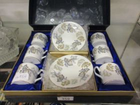A Coalport 'Camelot' six mug and saucer set in presentation box