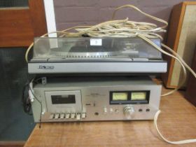 A JVC turntable together with a Rotel Stereo cassette tape deck