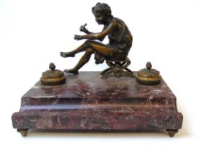 A 19th centry French rouge marble and gilt bronze desk standish, the marble base with pen well and