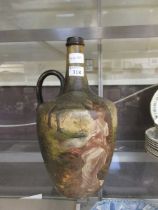 A Doulton Lambeth water jug with classical wooded scene decoration