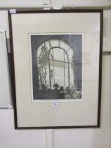 A framed and glazed limited edition etching 5 of 50 of French buffet scene