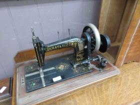 A Kay and Co hand operated sewing machine with case