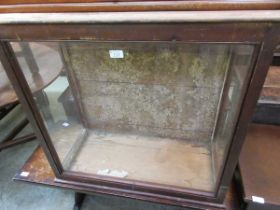 A stained pine and glazed display unit for taxidermy