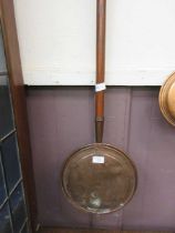 A copper warming pan