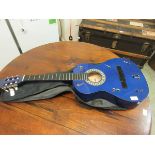 A blue acoustic guitar by Stagg along with soft carry case (Incomplete)