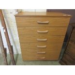 A teak effect six drawer bedroom chest