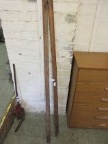 A pair of early wooden stilts