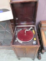 An early Columbia wind-up gramophone player together with a collection of early vinyl records