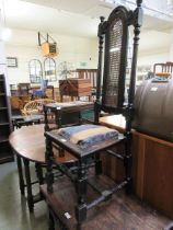 A reproduction oak and Bergere dining chair