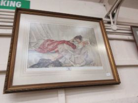 A framed coloured print after Russell Flint of reclining lady