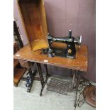 A Singer treadle operated sewing machine