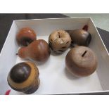 A box of treen fruit