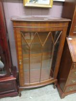 A reproduction mahogany glazed display cabinet