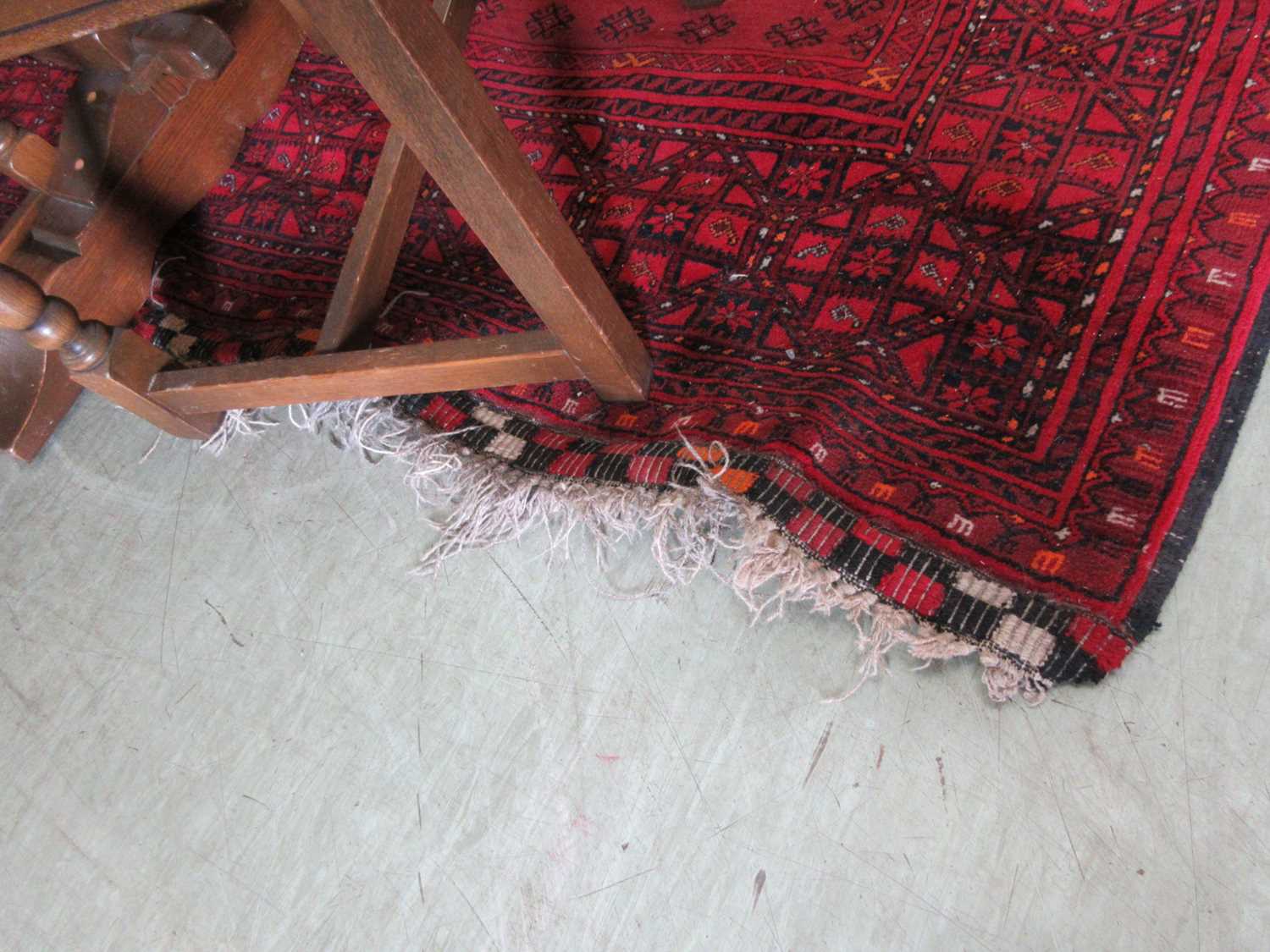 A Turkoman style red carpet Fringe appears to have been damaged on one side. Tape to back of rug, - Image 2 of 3