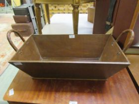 A beech and bamboo twin handled trough