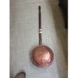 A copper warming pan