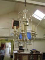 A 20th century glass six branch chandelier with cut glass and blown drops, h. 83 cm One long drop