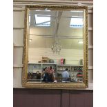 A large rectangular gilt mirror