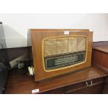 A Regentone radio in walnut case