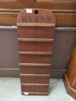 A church wall mounted hymn number board