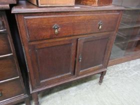 A mid-20th century cabinet having drawer above a pair of cupboard doors Dimensions: H, 92cm , W,