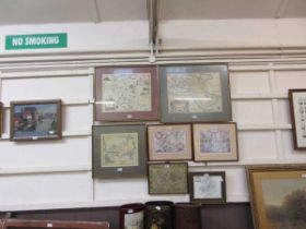 Seven reproduction framed and glazed coloured maps