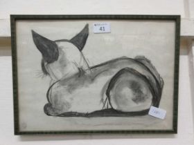 A framed and glazed drawing of a cat