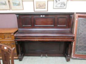 A Wade piano on mahogany base