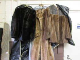 Three fur jackets