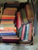 Two trays of hardback books on various subjects