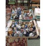 Two trays of oriental style figures