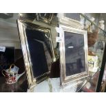 A pair of silver hallmarked easel photo frames Minor scuffs around the frame, small dent on the