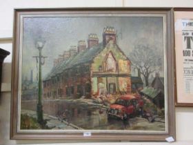 A framed oil on board of building and car scene signed bottom left A.Davies