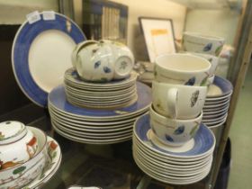 A selection of Wedgwood 'Sarah's Garden' tableware consisting of plates, cups, saucers and bowls