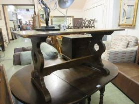 A mid-20th century oak refectory style occasional table