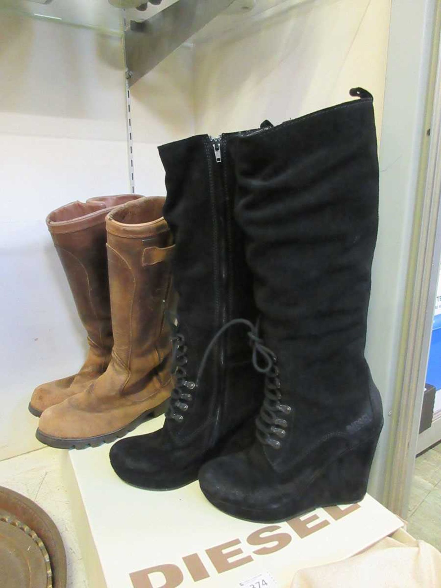 A pair of size 6 brown leather worn Musto boots, together with a pair of Diesel boots in box