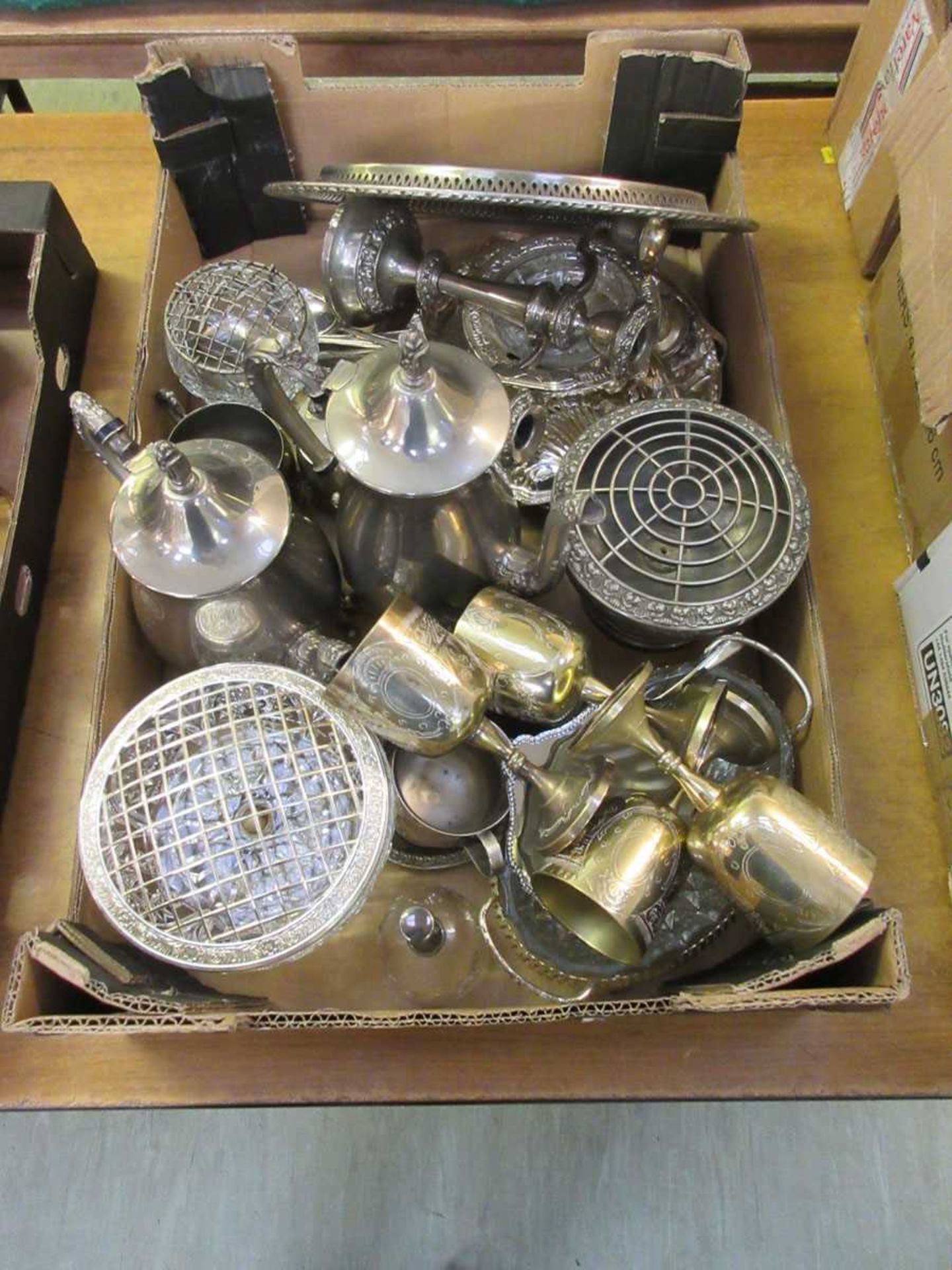 A tray of various plated ware