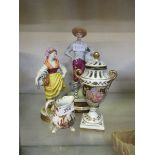 Two continental ceramic models of lady and boy together with lidded ceramic floral decorated urn and