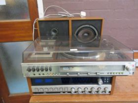 An Aiwa music centre together with a Tandberg tuner unit and a pair of speakers