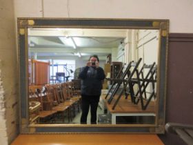 A reproduction Regency style rectangular bevelled glass mirror of large proportions