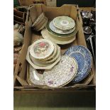 A tray of decorative ceramic plates