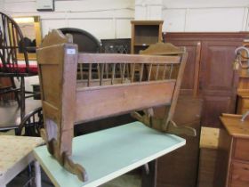 A late Victorian/early 20th century pine rocking crib