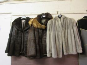 Three fur coats Small mark on middle jacket, no other apparent stains, missing fur or marks inside